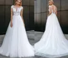 Cap Sleeves Tulle 2022 Wedding Dress A-Line O-Neck Beach Party Bridal Gown ILLUSION Button Lace Appliques Vestido De Noiva Robe Mariee
