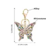 Butterfly Keychains автомобиль Ключ Кольца Держатель Женщины Мода Кристалл Горный Хрусталь Сумка Подвеска Подвески ОДВ Нарученные Украшения Подарочные Клейкие Цепи Сумки Аксессуары