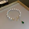 Charm Bracelets Electroplating Freshwater Pearl Bracelet Cupid Love Arrow Drop-shaped Pendant French Light Luxury JewelryCharm