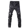 Designer-Herrenhosen Herbst und Winter neue trendige schwarze Lederhose mit Totenkopf-Print schlanke koreanische Version des Motorradfußes winddichte Herren-Hip-Hop-Mode 4JGX