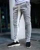 Mens Joggers calças casuais fitness masculino esportivo tracksuit de traje skinny calça calça calças de ginásios pretos 220509