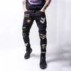 Brand 2022 Calças masculinas Novo jeans de designer de moda Rapped calça jeans de luxo Hip Hop Troushers Zipper para masculino tamanho 28-40