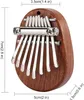 Mini Kalimba Thumb Piano przenośne odkrycie Solid Wood 8 Keys Marimba Musical Finger Piano For Adults dla początkujących 235o2434410