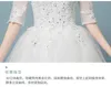نصف الأكمام الشهيرة فستان العروس العالي ذوي الياقات البسيطة نمط تطريز مثير عارية الهمديات الزفاف 6304092