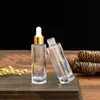Frascos conta-gotas de vidro transparente de 30 ml Frasco de perfume de óleo essencial de parede grossa de 1 oz com tampa superior dourada