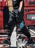 Мужские повседневные грузовые брюки мужчины черные корейские брюки гарема Тенденция Свободная брюки Уличная одежда Pantalon Homme Рефлексивная техническая одежда мужчина 220621