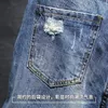 22SS tendencia masculina de jeans grandes agujeros en primavera y verano japoneses japoneses leggings delgados jóvenes mendigos holgados rectos pantalones
