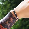 Bracelets de charme bracelet en cuir rétro pour hommes femmes noires vintage tressé mâle en acier inoxydable fermoir magnétique banglecarm Inte22