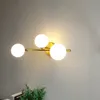 北欧のクリエイティブガラスボールウォールランプリビングルームメタルウォールライトファッションモダンベッドサイドランプ装飾照明器具1/2 /3heads