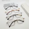 Nuevo diseño de moda gafas ópticas 50008U marco de metal cuadrado lente transparente estilo simple y de negocios gafas populares versátiles