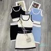 2022-frauen Zwei Stück Kleid Set Gestrickte Weste Mini Kurzen Rock Set Streetwear Fashion Crop Top Kleinen Buchstaben 4 farben Trainingsanzug