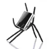 Supporto per telefono Spider universale di vendita caldo per tutti i cellulari Telefoni per auto Gancio per fotocamera Gancio per impugnatura Supporti per GPS