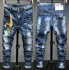 Jeans da uomo Stile europeo Italia Uomo Marchio di moda Pantaloni slim Pantaloni da uomo in denim Cerniera Foro blu Matita per uomoUomo