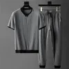 Men's Tracksuits Sets masculino Mangas curtas Tops elásticos da cintura elástica masculino masculino de duas peças conjunto de streetwear coreano masculino grande tamanho 220826