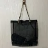 Mode femmes casual noir grand sac en maille sacs à provisions épaule Bale articles populaires dans les pays européens et américains