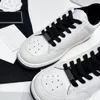 Modeskodesigner kvinnor Läder Sneakers Sneakers Färgmatchning Vit Svart Platt sula Dam Klassiska Lyxiga Casual Skor