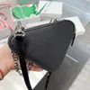 Saffiano Leather Mini Pouch Bags Designer Crossbody Triangle Silhouette Zipper Closure Clutch Purse Handbag Nylon Lining Shoulder 3104