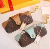 luxury- High Quality Leather Letter Alloy Glasses Case Carabiner Keychains for Lover Sunglasses Case Fashion Accessories Supply