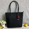 أكياس كبيرة 2022 New Canvas Nylon Women Women Bag Axford Butot Bags One One Counter Prace Handbag Myy M44495