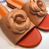 Pantofole Donna Fiore Sandali piatti Scarpe da spiaggia Designer Lusso Gomma Moda Infradito Arancione Donna Muli retrò Mocassini Muli da donna in pelle