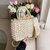 Kvällspåsar Kvinnor Straw Tote Bag 2022 Designer Purse och Handbag Lady Fashion Casual Drawstring Pearl Tassel Woven Beach Shoulder Bagevenin