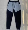2025 Estados Unidos corredores deportivos negro TECH FLEECE pantalones para correr Space Cotton Bottoms Tamaño asiático M-XXL