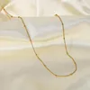 Colliers de pendentif ternissistes en acier inoxydable étanche gratuit Collier de chaîne de perles minces pour femmes au tour de tour de couchage à la mode minimaliste