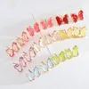 Pendientes de mariposa de araña colgantes Tema transparente de color para mujeres MS Simple Temperament Crystal Ear ST