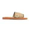 Tofflor Slide Designer Sandaler Dam Woody Platta Mules Slides Segel Canvas Vit Svart Dammode Strand Gummi Slipper skor