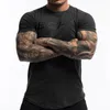 Mode homme t-shirt hommes hauts été Fitness musculation vêtements Muscle hommes chemises coton Slim Fit t-shirts 220421