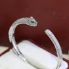 bracelet en diamant Panthere en laiton plaqué or 18 carats réplique officielle de bijoux bracelets de marque de luxe de qualité supérieure ADITA style classique dames bangl la plus haute qualité de comptoir