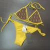 Sexiga kvinnors bikinis halter delad vadderad badkläder bokstäver låg midje baddräkt för kvinnor mode sommarlovet strand bh trosor baddräkt med slips