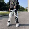 Letter Patch Design Baggy Jeans Herr Hip-hop Stjärnor Mönster Broderi Raka Denim Byxor Man Svart Tofs Ripped Byxor 2022 T220803