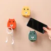 Ganchos rieles multifuncional pegatina de pared de dibujos animados gancho soporte para teléfono móvil enchufe soporte de acabado creativo adhesivo