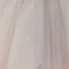 Nuovi abiti da ragazza di fiori rosa pesca per abiti da sera per feste di compleanno senza schienale con perline in tulle Abiti da ballo principessa in tulle