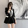 Costumes pour femmes Blazers Tide Marque Designer de haute qualité Grand sens de la petite veste de costume noire femme printemps 2022 design français sens de la couleur de collision haut court mince