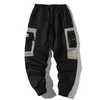 Hip Hop Mężczyźni Multi-Pocket Elastyczny Design Harem Pant Street Punk Casual Spodnie Joggers Mężczyzna Cargo Spodnie ABZ51 220330