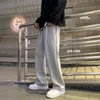 Spodnie dresowe Mężczyźni Proste Spodnie Harem Mężczyzna Koreański Człowiek Luźne Dorywcze Jesień Streetwear CN (pochodzenie) Pełna długość Four Seasons 220325