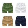 Baby pojkar kläder sommar barn kort stil byxor cool pojke casual outwear elastic mjuk khaki shorts bomull ren färg shorts 220707