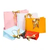 Gift Wrap 10st Luxury Bag Box Bow Ribbon Black Simple Paper Kraft Candy med handtag Bröllopsfödelsedagsförpackning