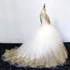 結婚式のスパゲッティレースのロングテールスカートの女の子のページェントのドレスのための新しい金の花の女の子のドレス