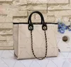 Bolsos de diseñador Bolsos clásicos Bordado Carta Impresión Totes Bolso de playa Compras Bolso de mujer Monederos Bolso de mano Paquete de lona