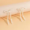 Dangle Lustre Perles Perles Bowknot Boucles D'oreilles Pour Femmes Élégantes Longues Perles Perlées Gland 2022 Mode Bijoux De Mariage AccessoiresDa