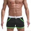 Été plage porter nouveaux hommes sport conseil shorts mode homme et femmes shorts décontractés mince flèche pantalon Y220420