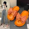 Sandały Buty dziury Kobiety Big Bow Slippers 2022 Wszechstronne Hollow Out Beach Sandals Guma Biała platforma Slides High Heels 220412