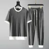 Herrspårar Sommarmans set 1 Top Pants Solid Color Pocket Stretchy Round Neck veckor för kontorsmode Male Clothingmen's