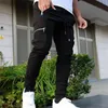 Męskie spodnie jogger dres do śledzenia mężczyzn Slim Fit Trening spodnie męskie multi-kieszeni swobodny chudy męski design sportowy