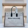 2022 Moda trendi Kadın çanta Rive Gauche Tote alışveriş çantası Kadın çanta üst keten Büyük Plaj çantaları Tasarımcı seyahat Crossbody Omuz çantası Cüzdan Tote
