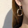 Dingle ljuskrona 2022 geometrisk ring dubbel spänne örhängen hong kong stil enkel legering oregelbunden europeisk och amerikanska smycken