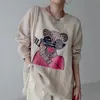 Camiseta de mujer Principios de otoño Blusa de estilo coreano Mujer Cuello redondo Manga larga Estampado de dibujos animados Blusa informal suelta Parte posterior dividida DF189Mujer